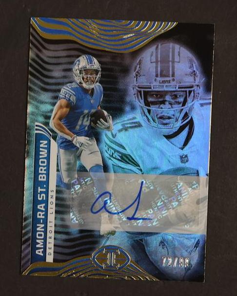 2022 Panini Illusions Trophy Collection Amon-Ra St. Brown #32 Auto /99