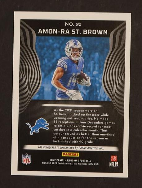2022 Panini Illusions Trophy Collection Amon-Ra St. Brown #32 Auto /99